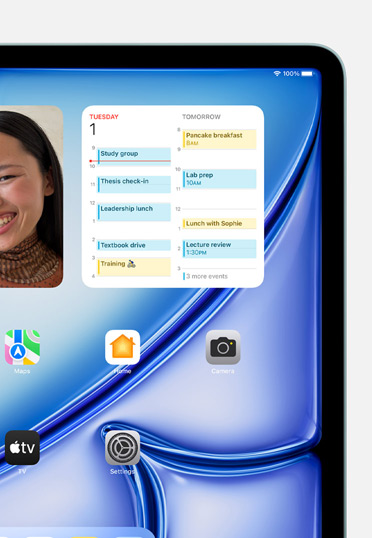 Plusieurs widgets et apps sur un écran, notamment Photos, Calendrier, Plans, Maison, Appareil photo, TV, News et Réglages.