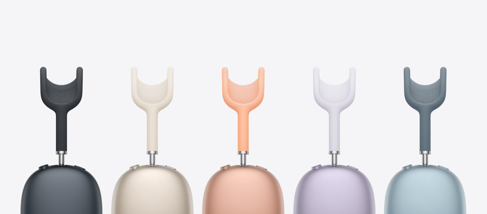 „AirPods Max“ vaizdas iš šono – yra vidurnakčio, žvaigždžių šviesos, oranžinės, violetinės ir mėlynos spalvų.