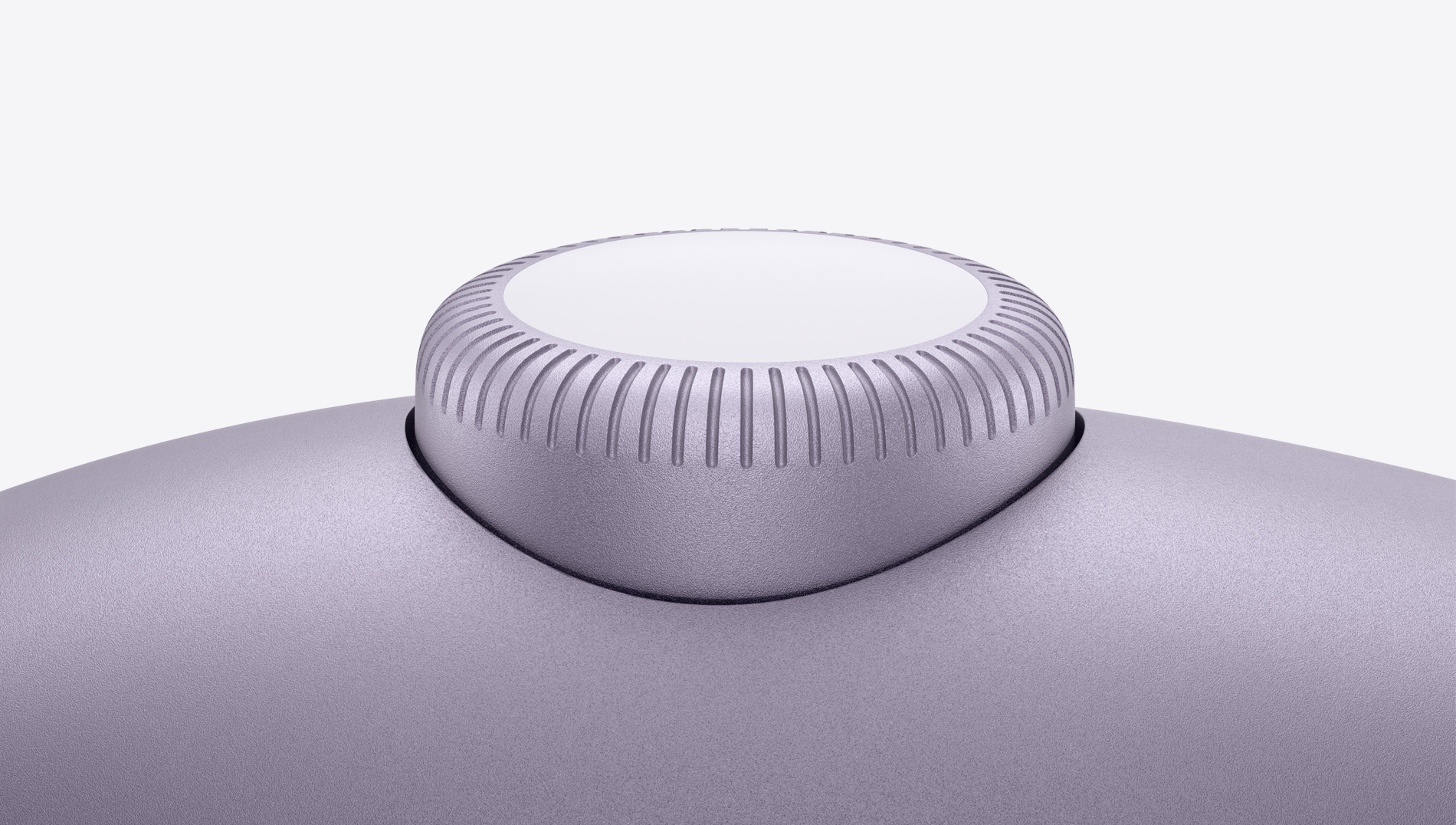 Közeli kép a lila színű AirPods Max Digital Crownjáról.