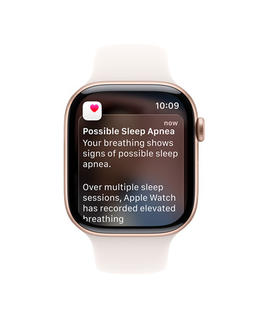 Apple Watch Series 11, kleur roségoud, kast van aluminium, geopende melding voor slaapapneu, rechterkant, Digital Crown, sportbandje, kleur rosé