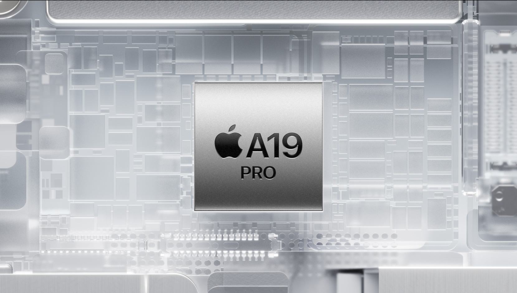Une puce A19 Pro entourées de composants lumineux à l’intérieur d’un iPhone