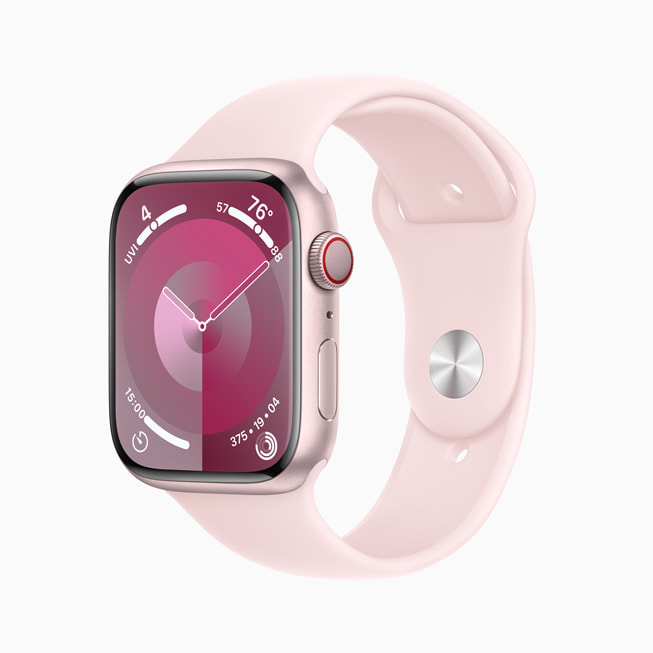 Pembe bir Spor Kordon takılı, pembe alüminyum kasalı Apple Watch Series 9.