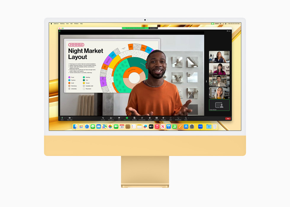 M3 çipe sahip sarı renkli yeni iMac’te bir video konferans gösteriliyor.