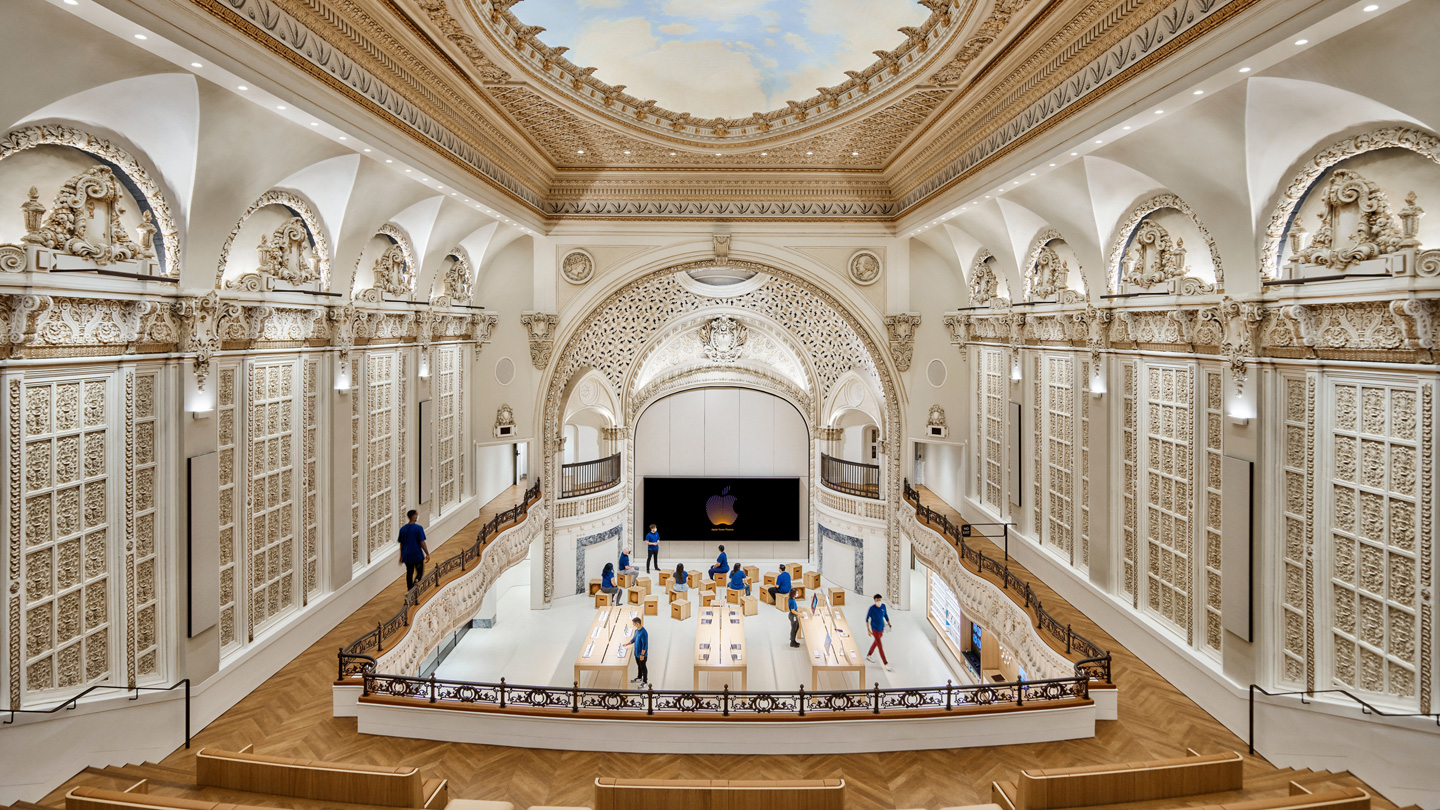 A view inside Apple Tower Theatre shows the dome, balcony, Forum and main sales floor.