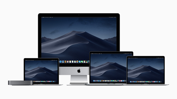 Mac notebooks in various sizes alongside the new space grey Mac mini and Mac desktop computers.