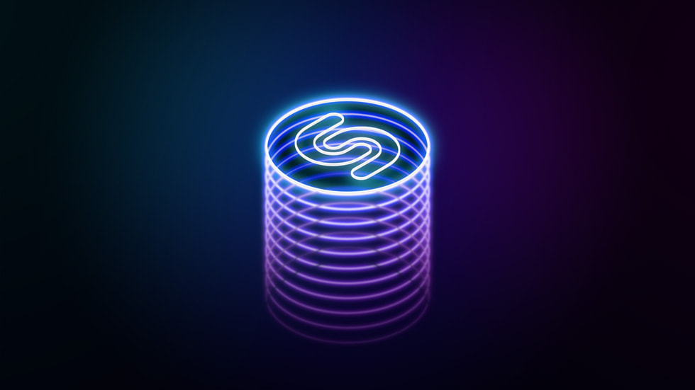 Siyah bir fon üzerinde Shazam logosu neon renkte gösteriliyor.