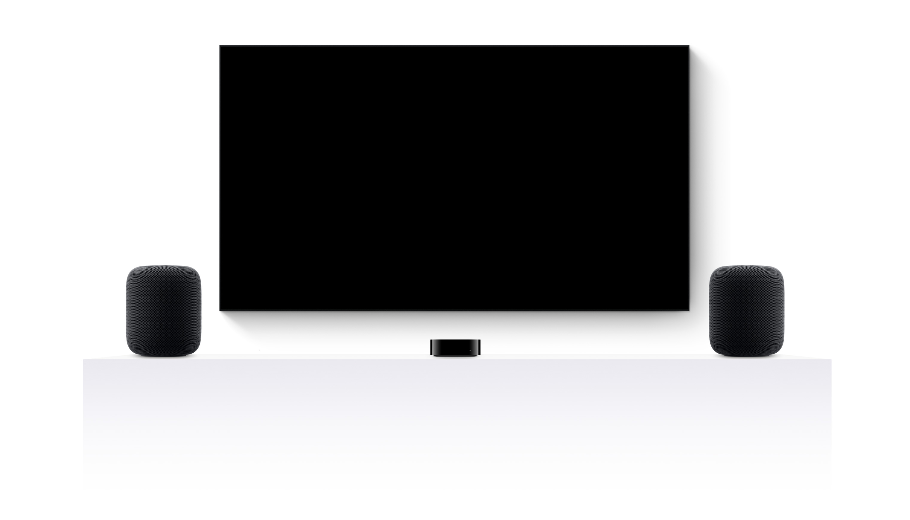 Apple TV 4K, dois HomePods e uma televisão de ecrã plano com um trailer editado de vários filmes e séries da Apple TV+
